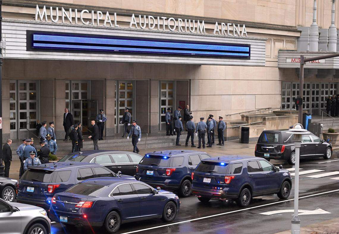 Beneath a “thin blue line” which adorned the marquee, law enforcement officers arrived to pay their respects to fallen Kansas City Police Officer James Muhlbauer, 42, and his police K-9, Champ, during a visitation Wednesday, Feb. 22, 2023, at Municipal Auditorium in Kansas City. The officer and K9 were hit and killed when a driver, traveling at a high rate of speed, allegedly ran a red light at Benton Boulevard and E. Truman Road and plowed into the officer’s patrol car on Wednesday, Feb. 15, 2023.
