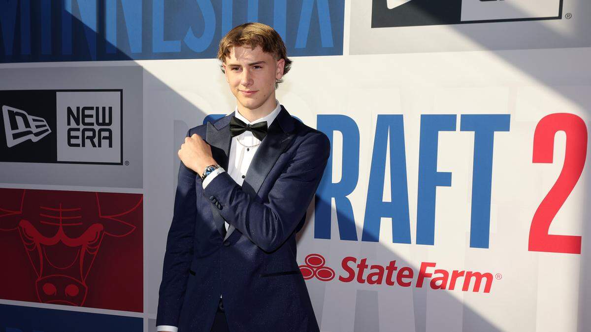 Johnny Furphy walked the red carpet before the first round of the 2024 NBA Draft at Barclays Center on Wednesday. Two Toronto tailors created his custom tuxedo that had the name of every Australian in the NBA printed on the lining.