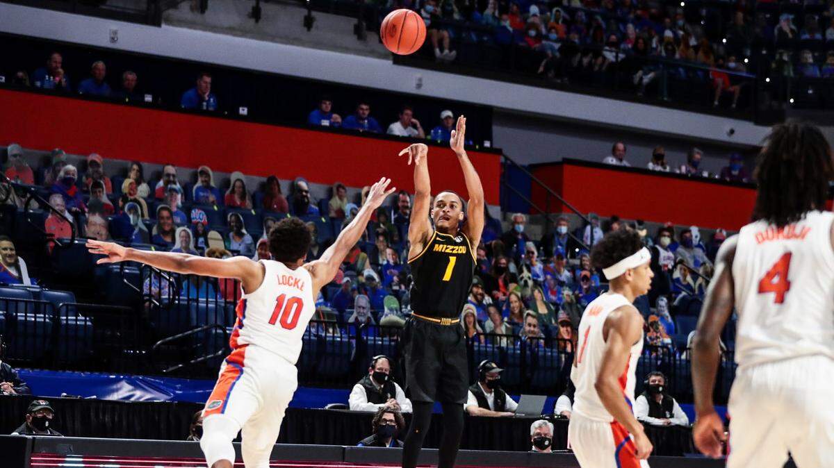Mizzou guard Xavier Pinson (1) puts up a jump shot against the Florida Gators at Exactech Arena in Gainesville on Wednesday, March 3, 2021.