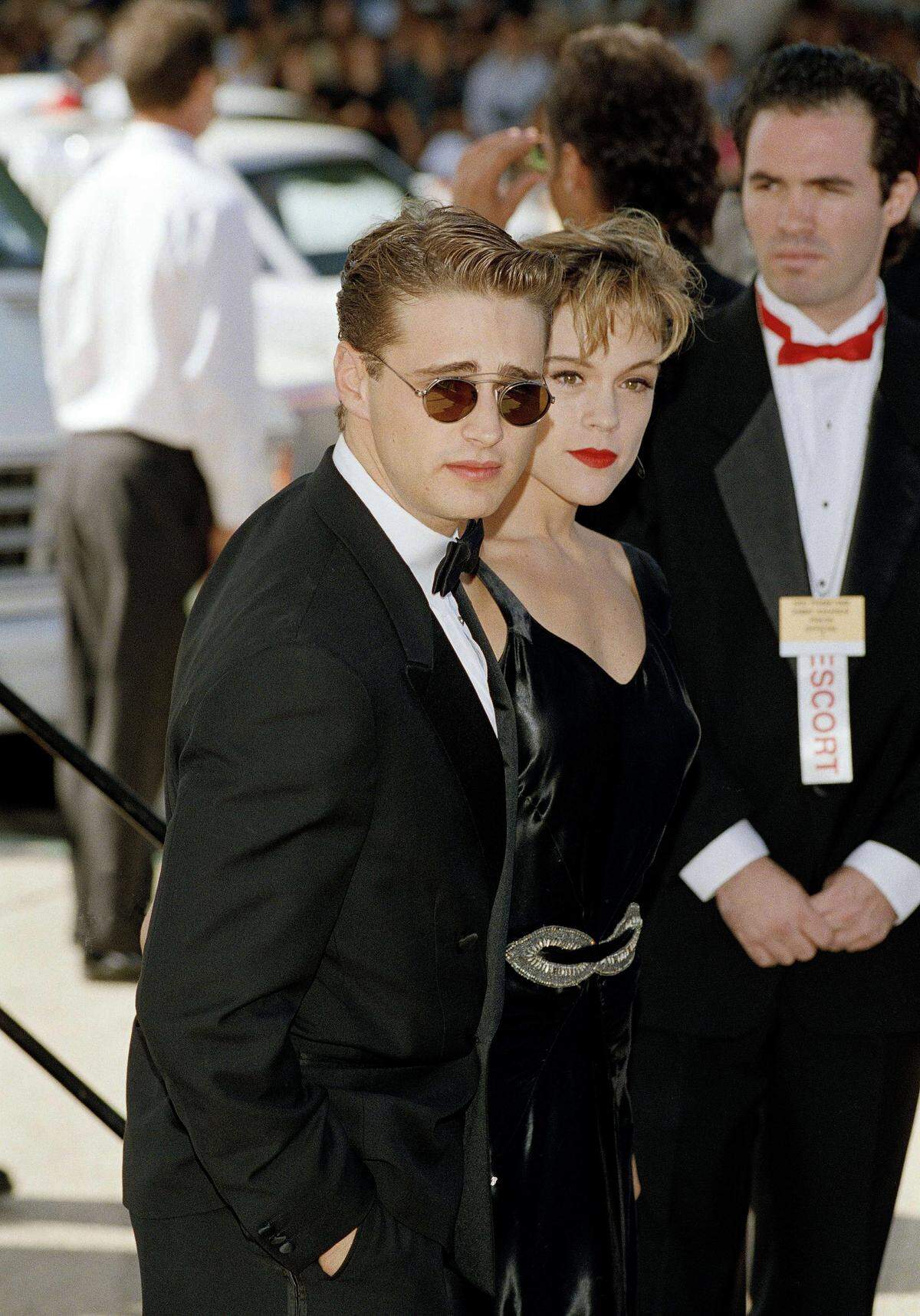 Jason Priestley arrives with girlfriend Christina Elise at the 44th annual Primetime Emmy Awards in Pasadena, Calif., Aug. 30, 1992.