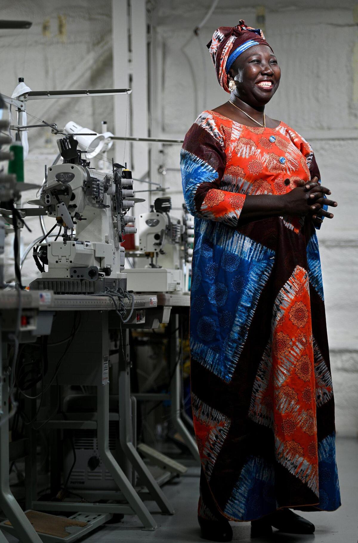 Tasilia Dale escaped mass killings and lost everything after war broke out in Maban County, South Sudan in 1996. She fled with her family to Ethiopia, then the United States. There are South Sudanese refugees in the Kansas City area, but she hasn’t found any from the Maban tribe. Instead she’s made a community of the refugee women who sew alongside her at Restoration Apparel.
