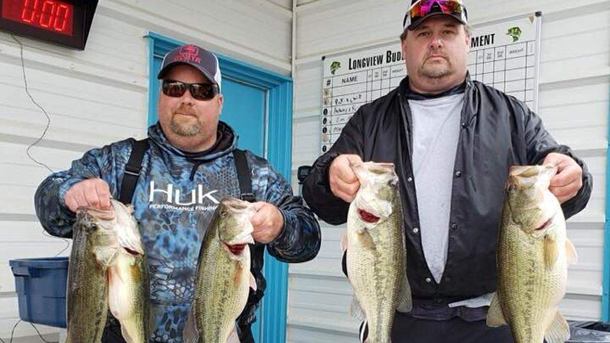Anthony Scoma, left, and Roy Butler hauled in 23.55 pounds of bass (five fish) in the weekly tournament at Longview Lake.