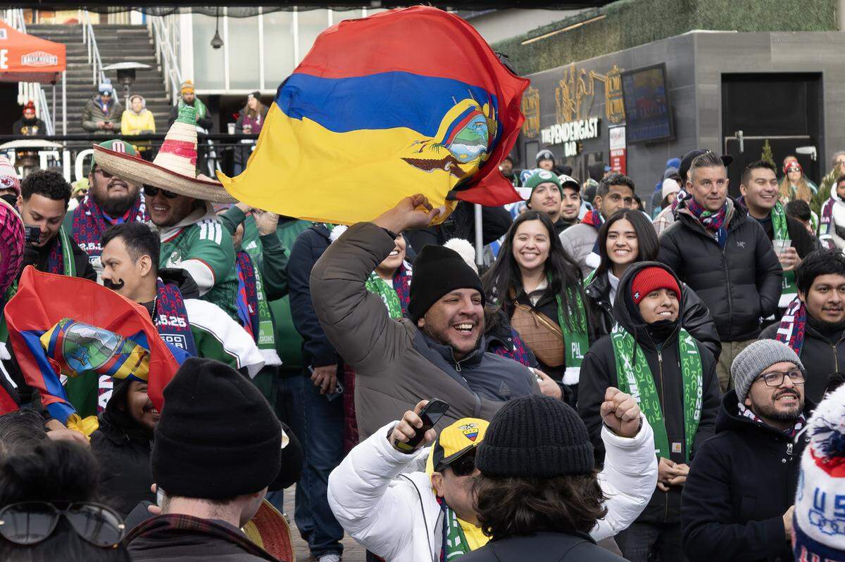 Colombia fans cheer as the teams for Group K of the FIFA World Cup are announced during a watch party at the Power & Light District on Friday, Dec. 5, 2025, in Kansas City.