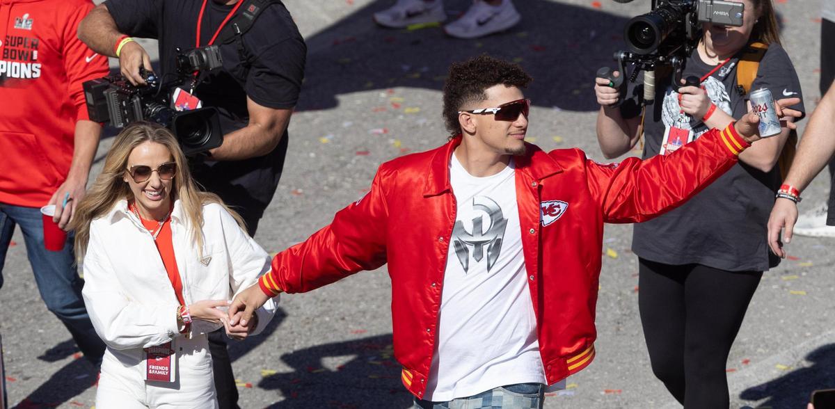 Patrick and Brittany Mahomes make their way down Grand Boulevard during the Chiefs’ Super Bowl parade on Wednesday.