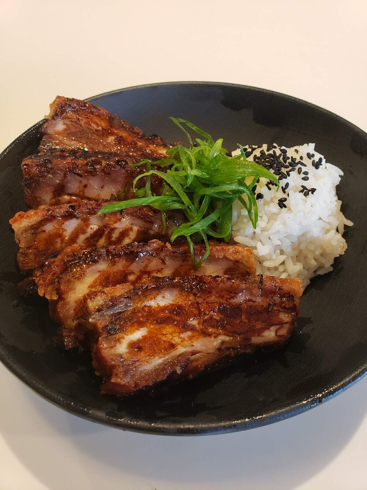 Duck & Roll’s crispy pork belly.