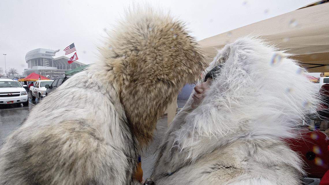 Many people keep warm with garments they got at thrift stores or as hand-me-downs.