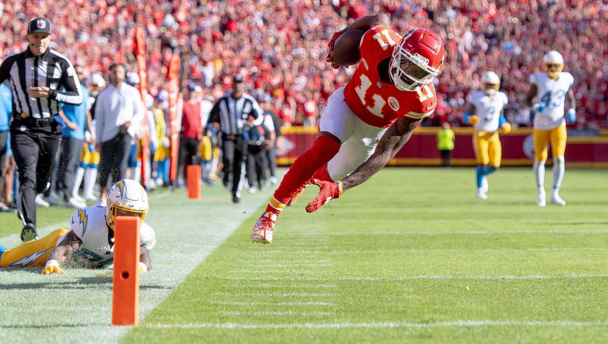 Kansas City Chiefs wide receiver Marquez Valdes-Scantling (11) scores a touchdown against the Los Angeles Chargers during an NFL football game at GEHA Field at Arrowhead Stadium on Sunday, Oct. 22, 2023, in Kansas City.
