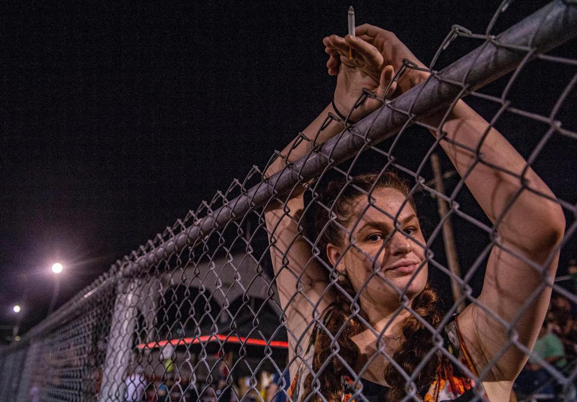 Casey Concannon poses for a portrait in between heats during the demolition derby at the Platte County Fair, Thursday, July 22, 2021, in Tracy, Mo