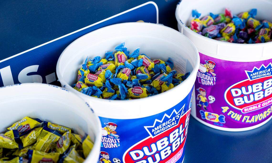 Tubs of bubble gum, regular and sugar free, sit inside the Kansas City Royals dugout before the team’s home opener against the Minnesota Twins Thursday at Kauffman Stadium.