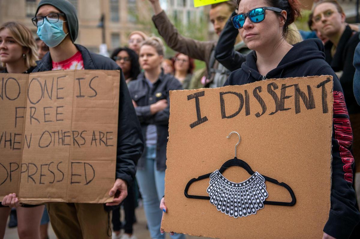 People rally outside City Hall in Kansas City on Tuesday, May 3, 2022. Many Kansas Citians wanted to show their support for abortion rights.