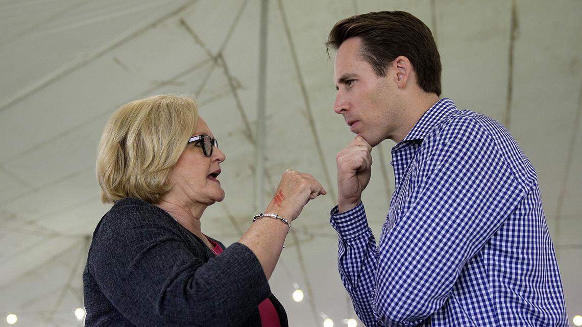 US. Sen. Claire McCaskill talks with Missouri Attorney General Josh Hawley in 2017.