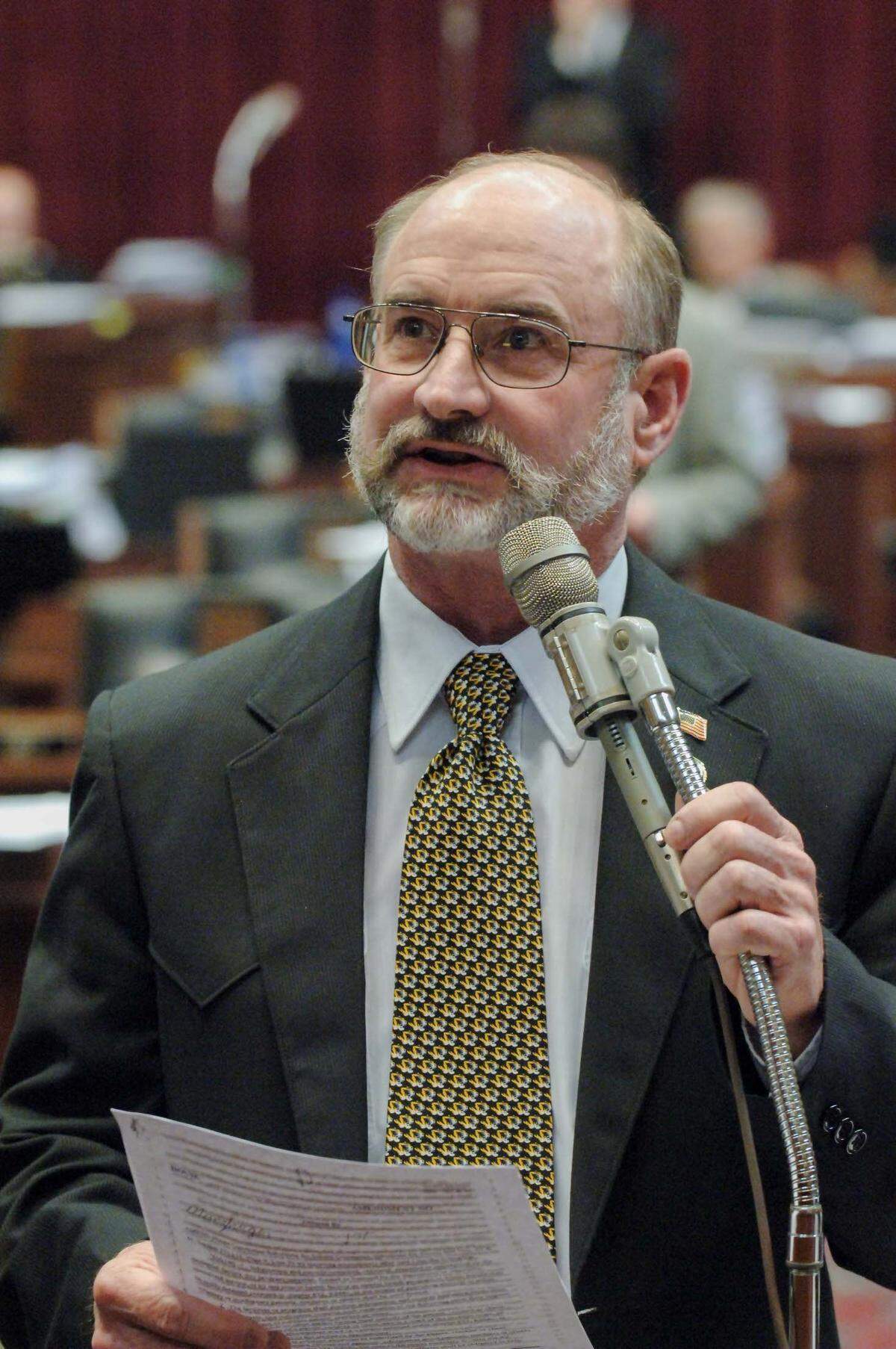 Brian Munzlinger, who in 2007 served as a House Republican from Lewis County, introduced a bill with the same language that later was taken up in a bill to repeal permit to purchase.