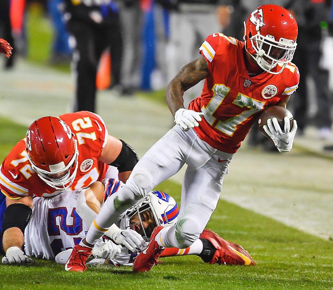Kansas City Chiefs wide receiver Mecole Hardman makes yardage on a 51 yard run in the second quarter Sunday, January 24, 2021, during the AFC Championship Game at Arrowhead Stadium in Kansas City, Missouri.
