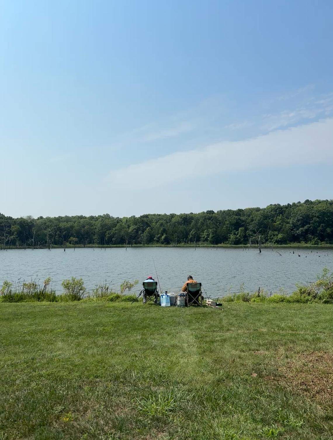 Visitors fishing at Kill Creek Park.