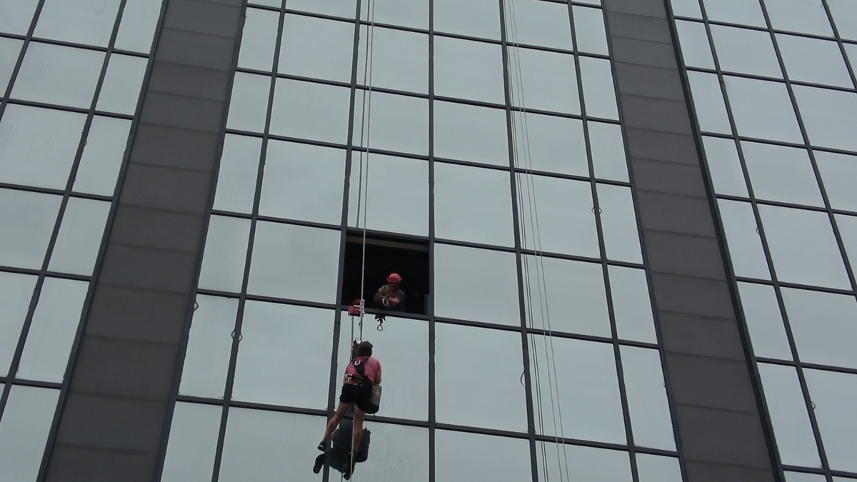 Kansas City firefighters responded shortly before 10:15 a.m. Tuesday, Sept. 24, to the 1200 block of Baltimore Avenue on a report of a window washer stuck on the side of One Kansas City Place, the city’s tallest building, after his main harness broke. A glass worker who happened to be on site helped firefighters rescue the window washer.