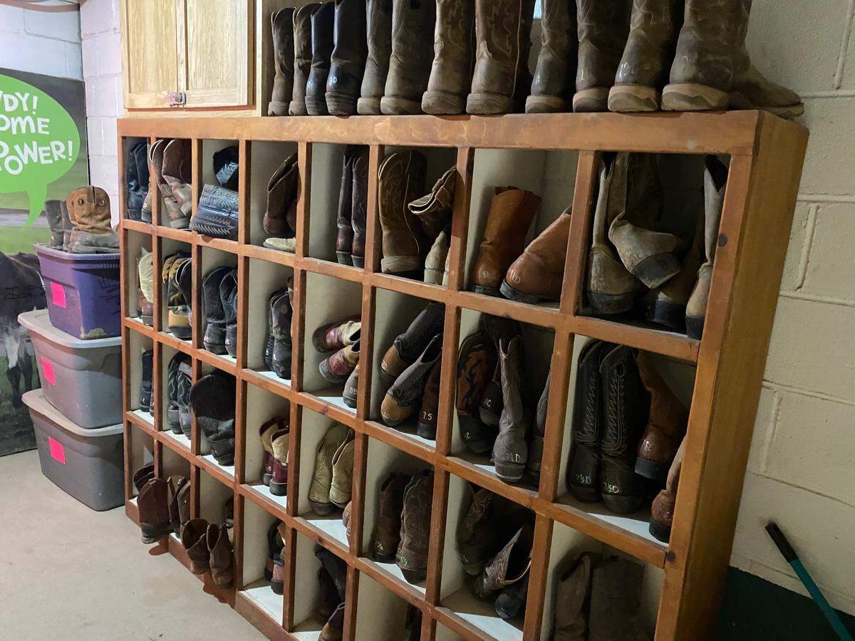 Children and adolescents involved in the program select boots from the HorsePower Boot Room before each session.