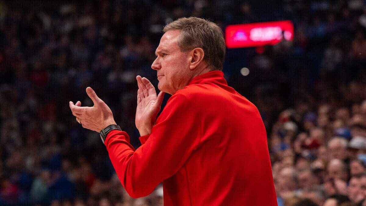 Kansas Jayhawks head coach Bill Self claps during a game against the Towson Tigers on Tuesday, December 16, 2025, at Allen Fieldhouse.
