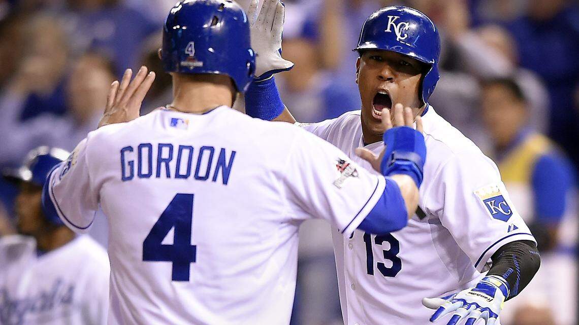 Kansas City Royals catcher Salvador Perez celebrated with left fielder Alex Gordon at home plate after they were both driven in to score in the fifth inning on a double hit by right fielder Alex Rios during Wednesday’s ALDS baseball game on October 14, 2015 at Kauffman Stadium in Kansas City, Mo.
