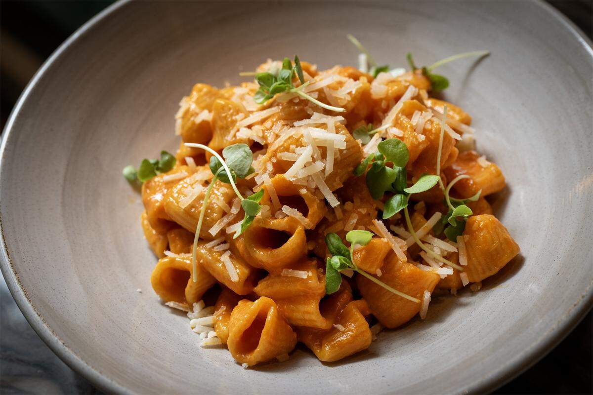 Signature Mezzo Rigatoni with Calabrian vodka sauce at Palm Beach Club, a new restaurant and bar opening this month at 14 E. 14th Street in Kansas City's Power and Light District.
