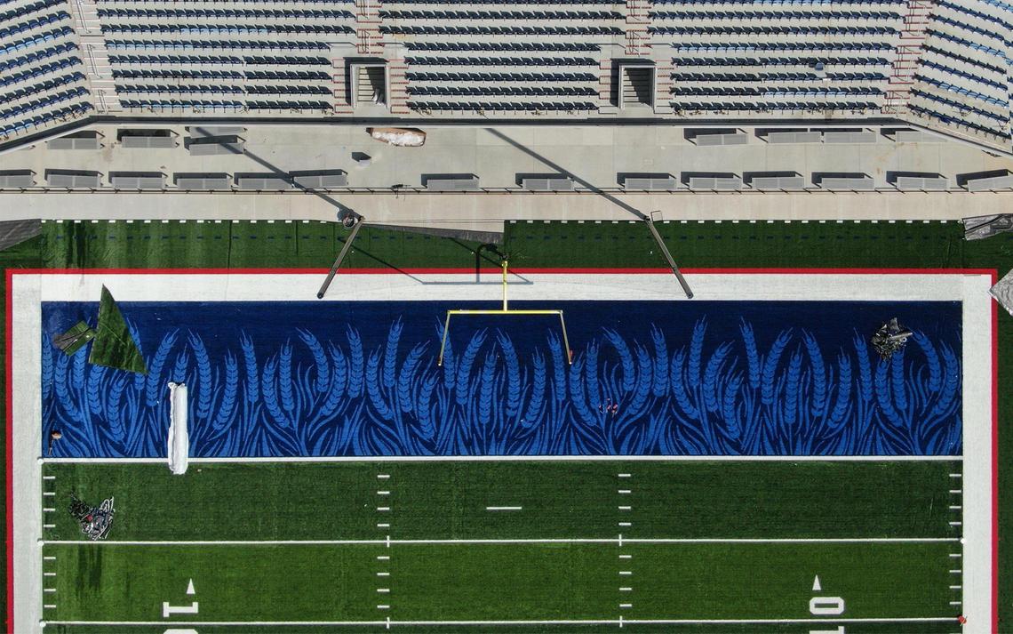 The new artificial turf at Kivisto Field, with its iconic blue end zones and waving wheat design, has been installed at David Booth Kansas Memorial Stadium.