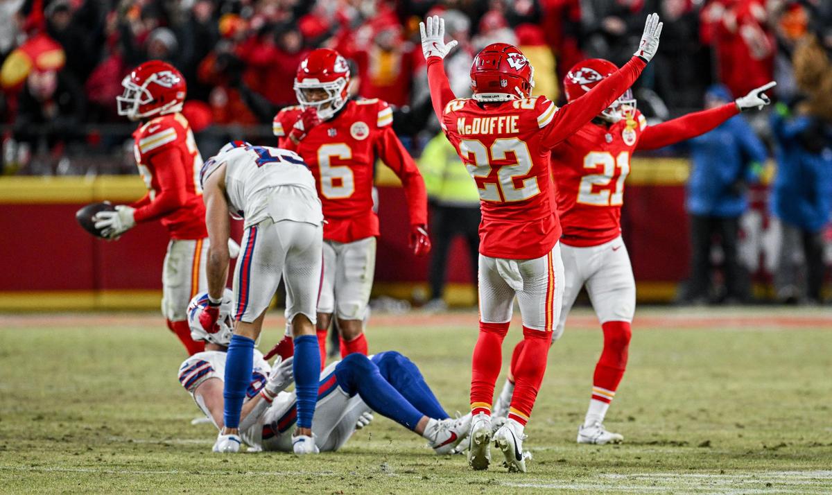 Kansas City Chiefs cornerback Trent McDuffie (22) celebrates with other Chiefs players after Buffalo Bills tight end Dalton Kincaid (86) couldn’t catch a pass on fourth down late in the fourth quarter during the AFC Championship Game on Sunday, Jan. 26, 2025, at GEHA Field at Arrowhead Stadium.