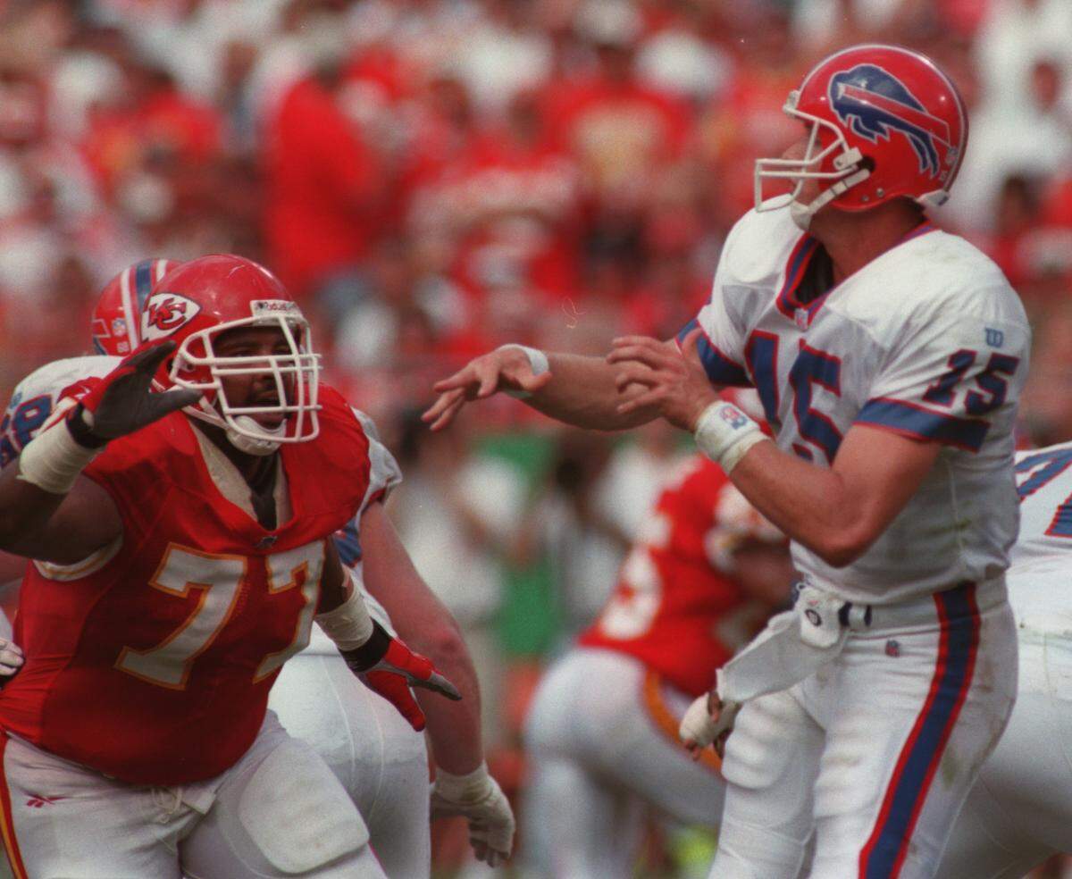 Chiefs defensive end Pellom McDaniels put pressure on Buffalo Bills quarterback Todd Collins during a game in 1997 at Arrowhead Stadium.