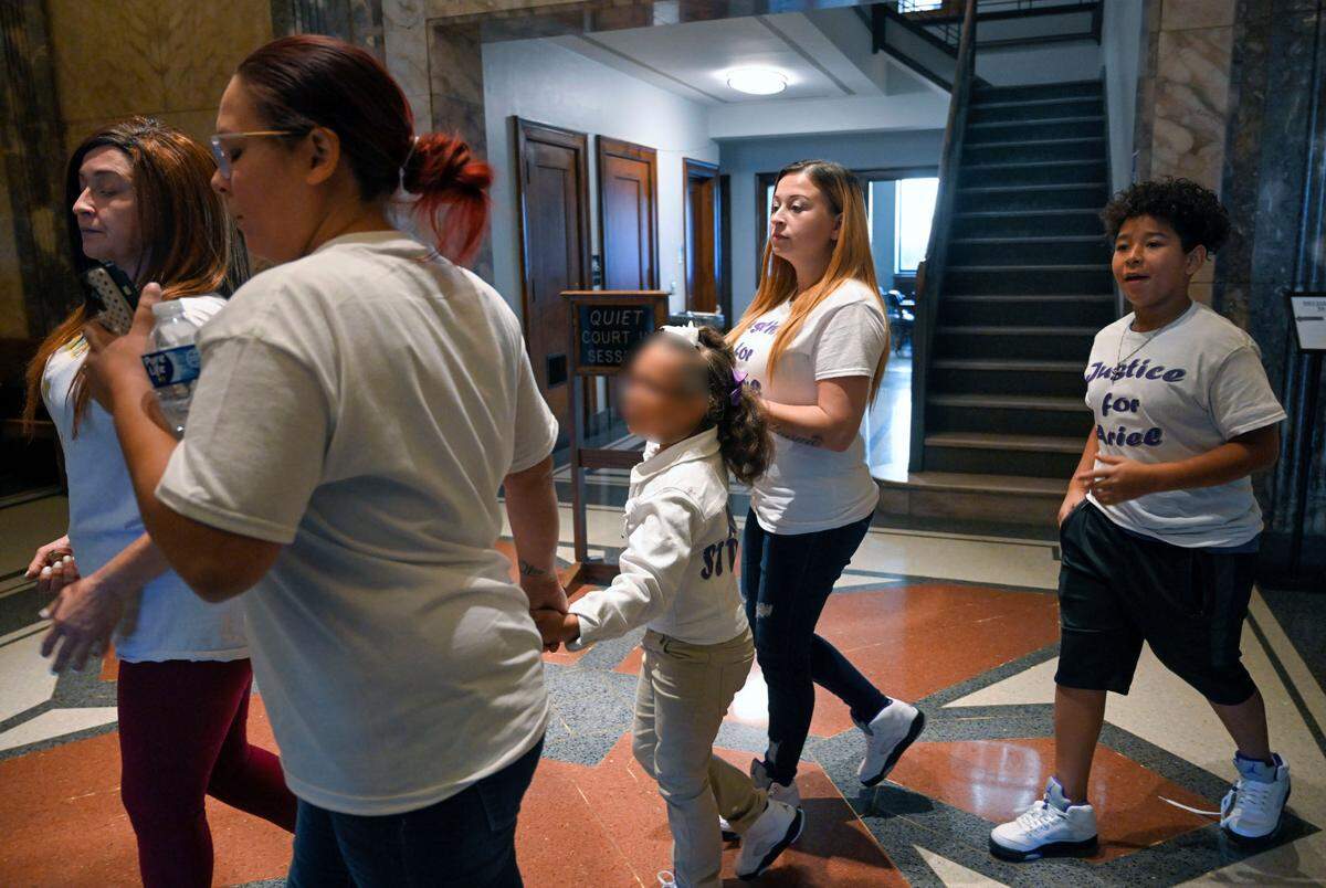 The family of Ariel Young leave the Jackson County Courthouse after Britt Reid was sentenced to three years in prison for driving while intoxicated and causing a 2021 crash that severely injured a 5-year-old Ariel.