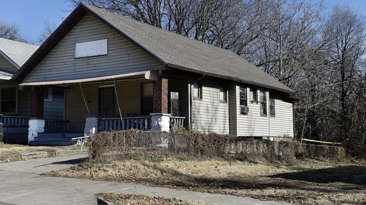 A man and woman were found dead in this house in the 2900 block of Monroe Avenue in Kansas City early Saturday morning.