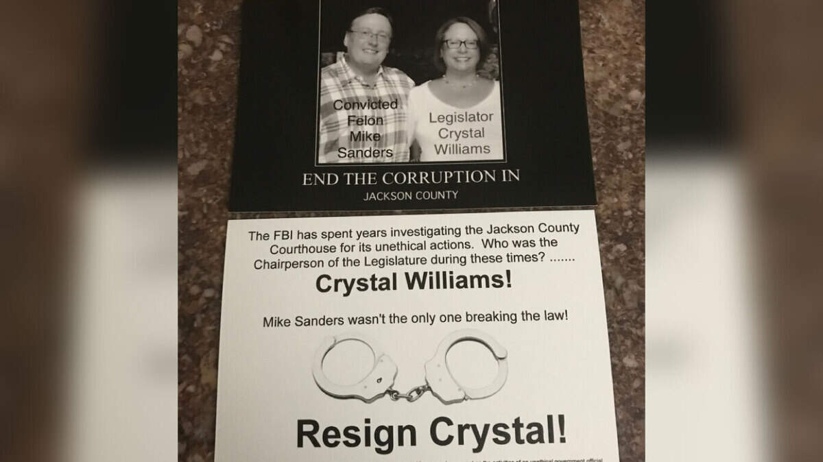 Fliers implying that Jackson County legislator Crystal Williams is a lawbreaker were piled up outside the doors to Tuesday night's regular meeting of the county Democratic committee in the county courthouse in downtown Kansas City.