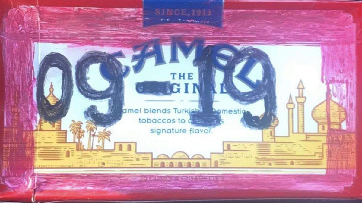 A creative New Hampshire resident crafted a fake vehicle inspection sticker out of a carton of Camels.