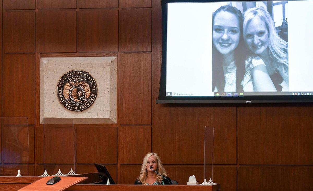 During the sentencing phase Jamie Runions talks about her daughter Jessica Runions as she makes her victim impact statement at the Cass County Justice Center Friday, April 16, 2021. A jury convicted Kylr Yust of second-degree murder in the death of Jessica Runions and voluntary manslaughter in the death of Kara Kopetsky.
