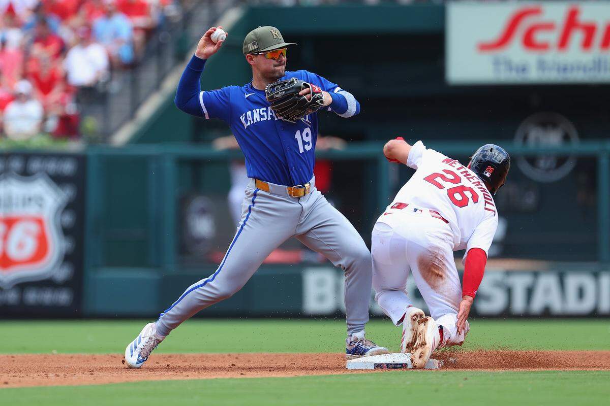 Kansas City Royals second baseman Michael Massey attempts to turn a double play against the Cardinals during an I-70 Series finale at Busch Stadium in St. Louis on Sunday, May 17, 2026.