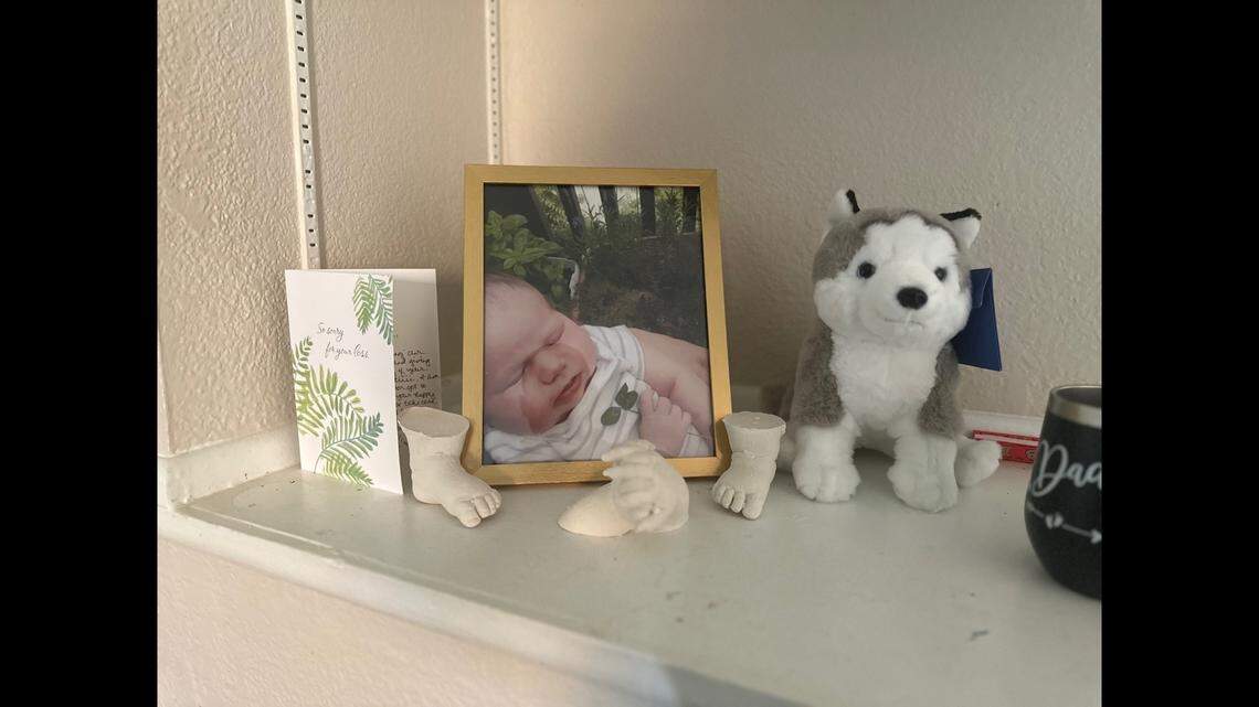 One of the few momentos Holder keeps in his home of Destinii is a picture of her and a plush dog toy.