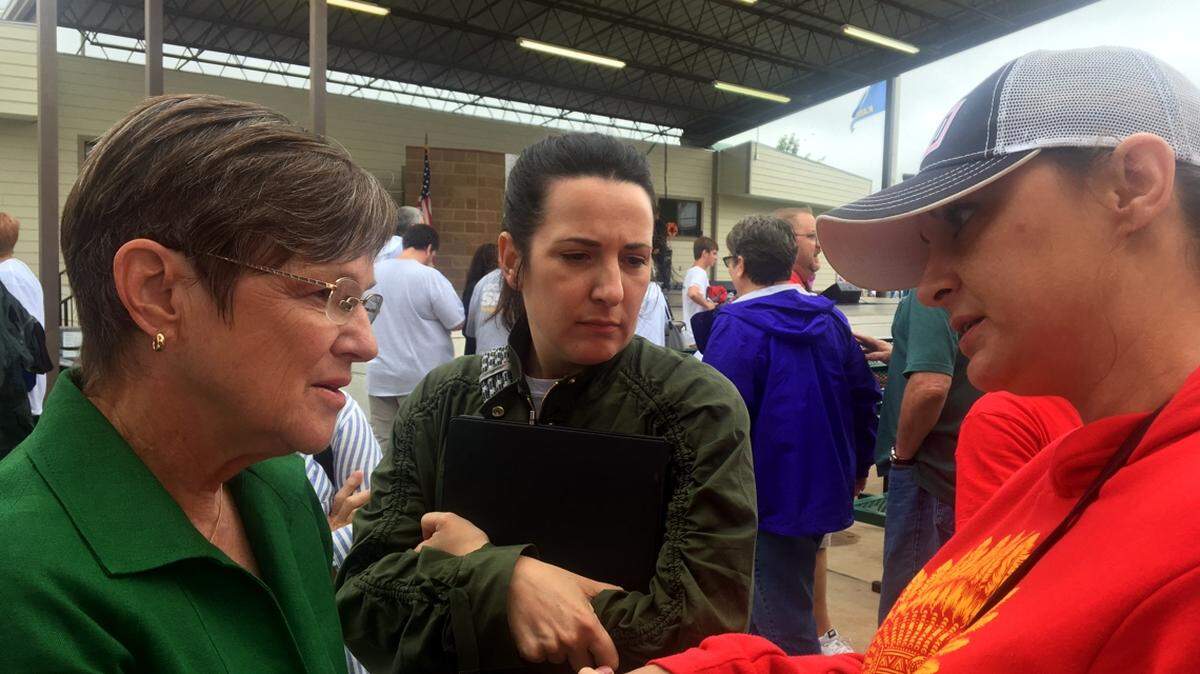 Kansas state Sen. Laura Kelly greets supporters of her campaign for governor at the Kansas State Fair in Hutchinson on Saturday, Sept. 8.