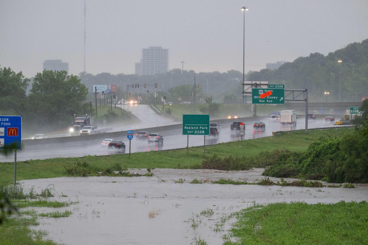 Heavy rains Monday, July 21, 2025, caused Turkey Creek to rise near I-35 and Lamar Ave exit in Kansas City, Kansas. 