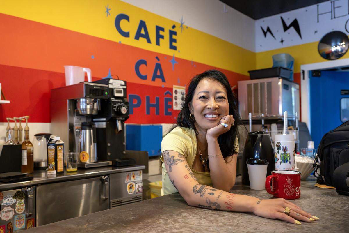 Jackie Nguyen, owner of Cafe Cà Phê, stands near the counter for a portrait on Friday, May 8, 2026, in Kansas City.