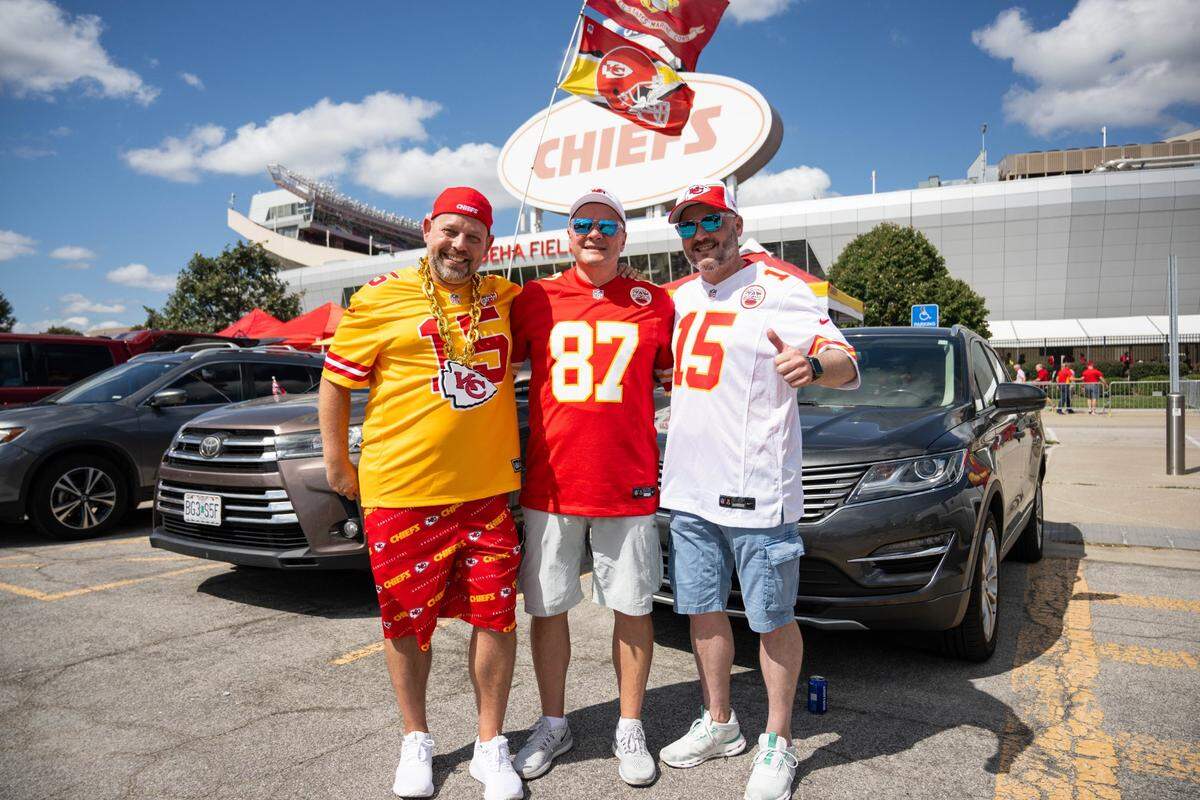 Miklos Vidal, Gabriel Sarkany, and Peter Sarkany tailgate before the Chiefs game when they took on the Cincinnati Bengals in September at GEHA Field at Arrowhead Stadium. The trio traveled from Switzerland for the game.