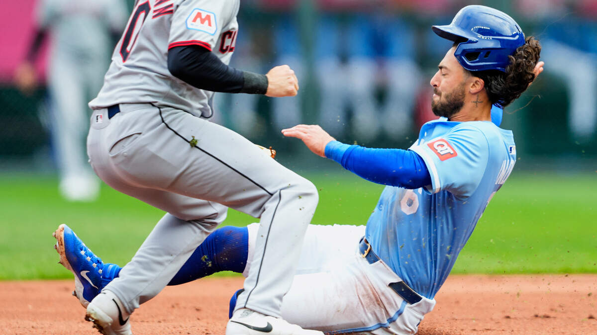 Mar 30, 2025; Kansas City, Missouri, USA; Kansas City Royals left fielder Jonathan India (6) is caught stealing by Cleveland Guardians second baseman Daniel Schneemann (10) during the first inning at Kauffman Stadium. Mandatory Credit: Jay Biggerstaff-Imagn Images