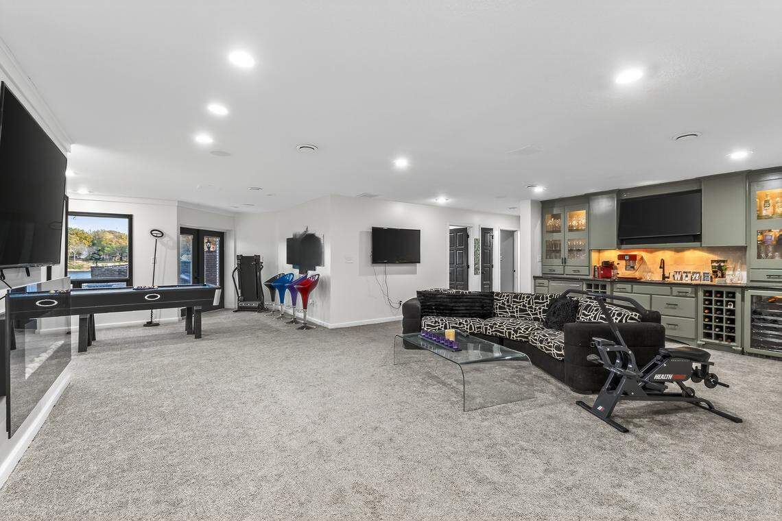 A second living room lies on the bottom floor of the residence at 102 NW Hackberry St. in Lee’s Summit. The home went through extensive renovations from 2022-2024.