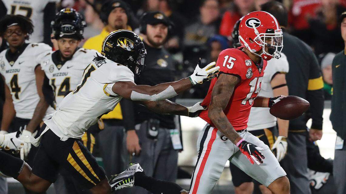 Georgia wide receiver Lawrence Cager (15) catches a long pass against Missouri defensive back Christian Holmes during the first quarter on Saturday, Nov. 9, 2019, at Sanford Stadium in Atlanta. (Curtis Compton/Atlanta Journal-Constitution/TNS)