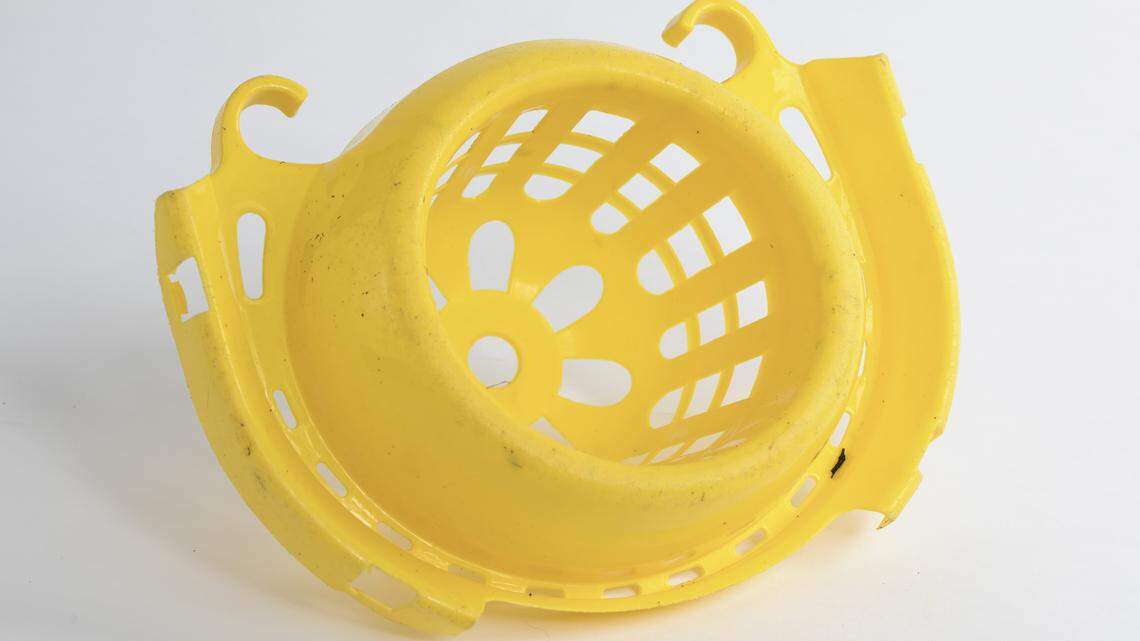 A yellow mop bucket.