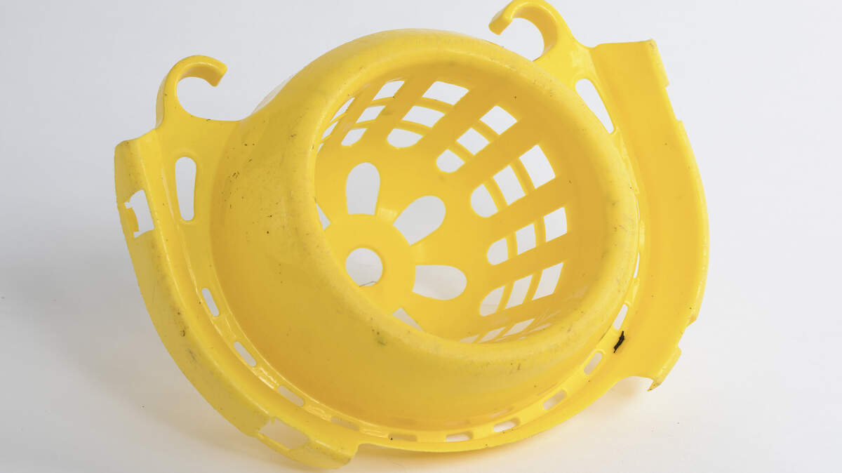 A yellow mop bucket.
