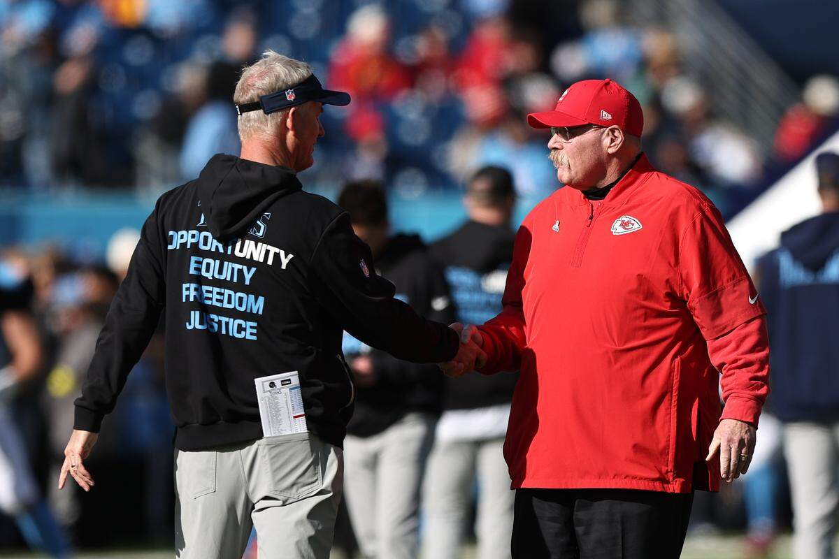 Kansas City Chiefs head coach Andy Reid, right, greets interim head coach Mike McCoy of the Tennessee Titans ahead of their teams’ NFL Week 16 game at Nissan Stadium in Nashville, Tennessee on Sunday, Dec. 21, 2025.