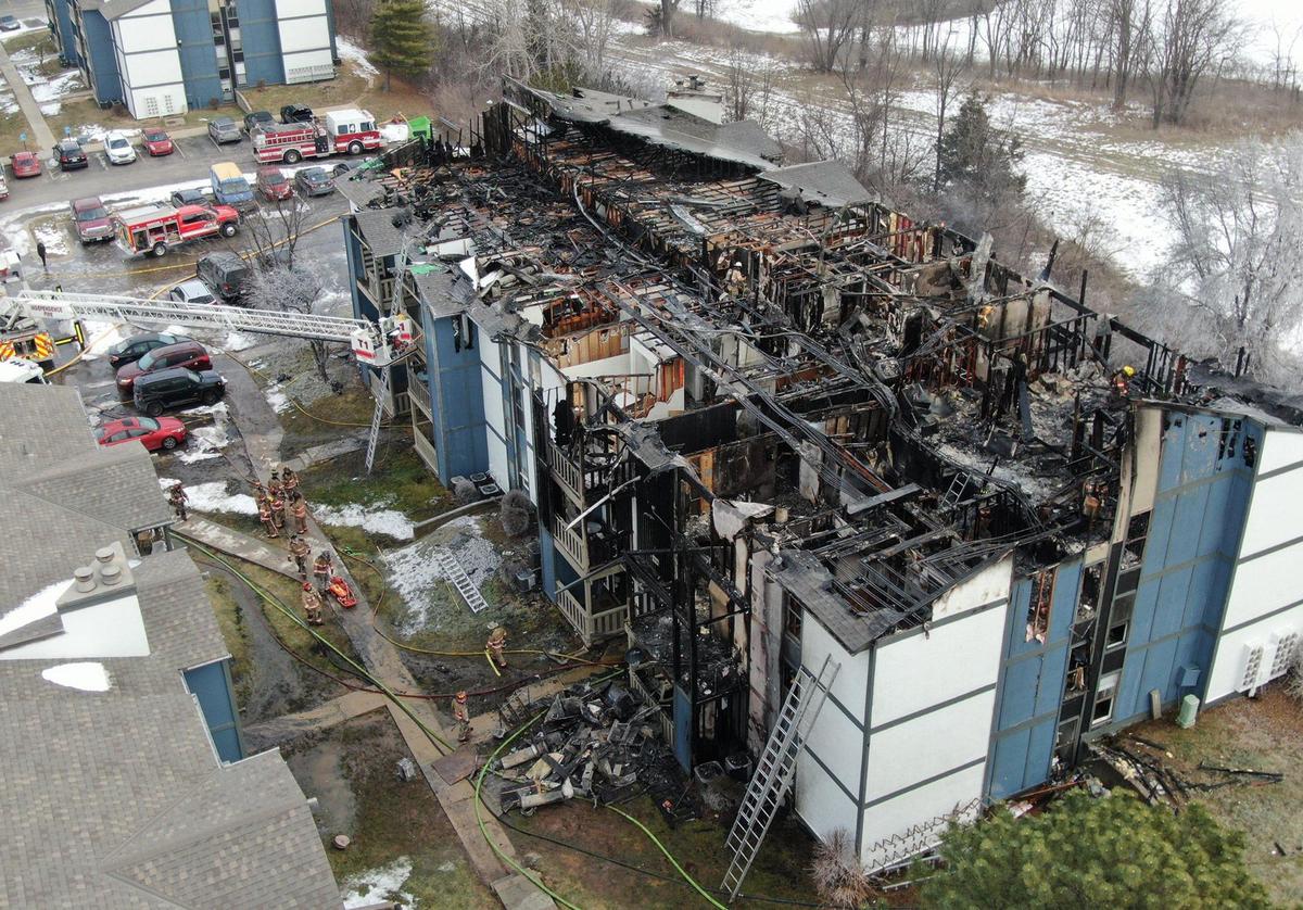 Firefighters remained on the scene after an early morning fire destroyed apartments in a complex in the 19000 block of East 37th Terrace, north of the Independence Commons shopping center on Wednesday, Jan. 22, 2025.