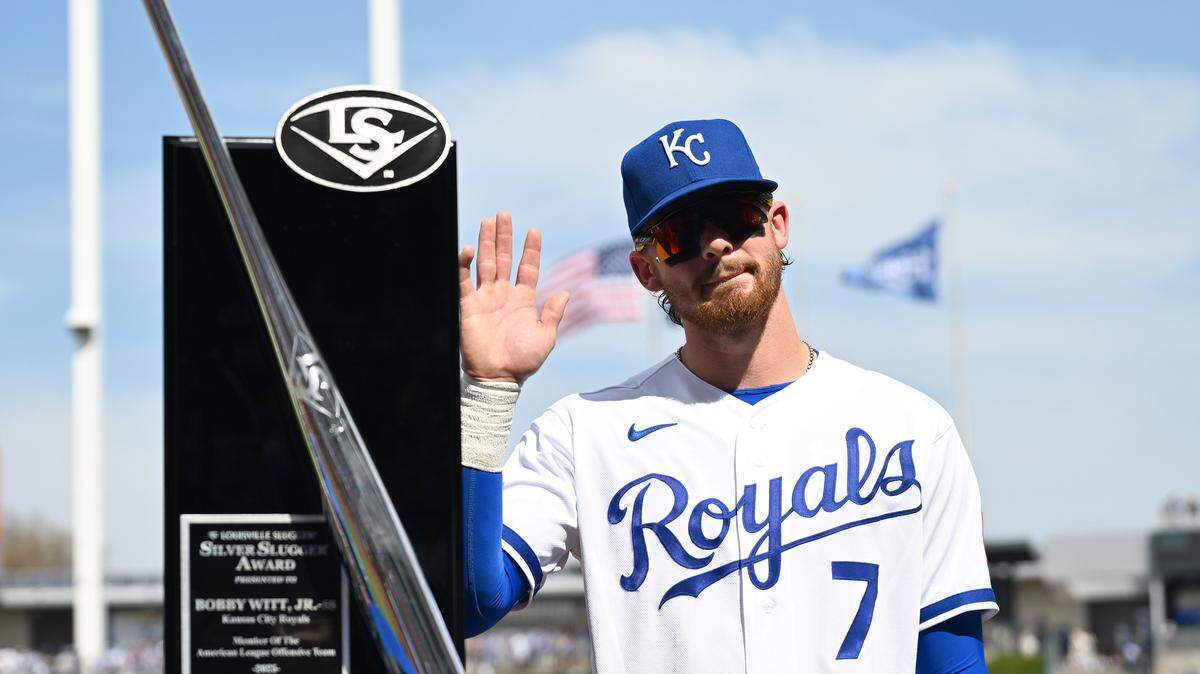 Kansas City Royals shortstop Bobby Witt Jr. (7) is awarded the Silver Slugger before the home opener against the Minnesota Twins on Monday, March 30, 2026, in Kansas City.