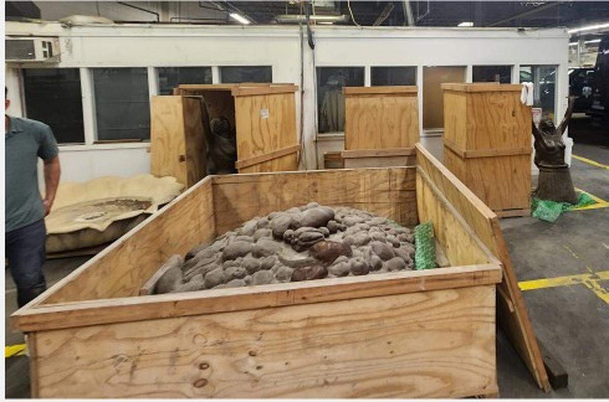 Bronze bowl of fruit, part of the Las Tarascas sculpture given to Kansas City in 2013 from sister city Morelia in Mexico, sits inside a crate in Kansas City, where it has been in storage for 12 years.