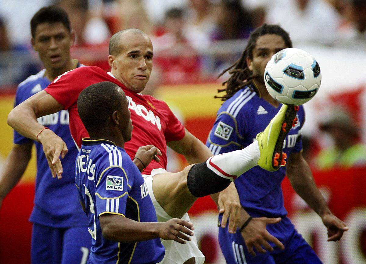 Manchester United’s Gabriel Obertan, at center, vies for the ball with Kansas City Wizards players during an international friendly at Arrowhead Stadium in 2010.