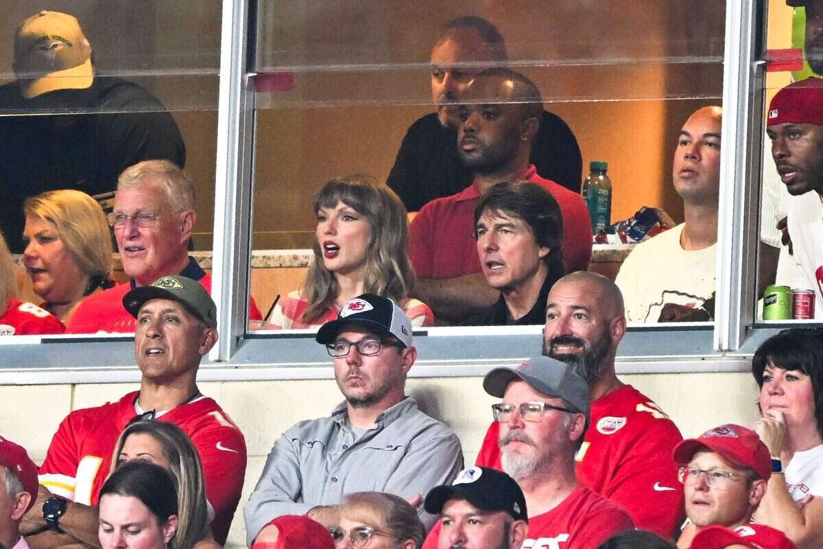 Taylor Swift and Tom Cruise at the Kansas City Chiefs vs. Denver Broncos NFL season opener at Arrowhead Stadium in Kansas City on Sept. 14, 2026.