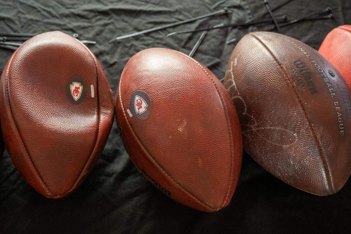 Official Chiefs footballs on display at The Pavilion at GEHA Field at Arrowhead Stadium on Friday, February 20, 2026. Fans can come and shop on Saturday for items such as game worn jerseys, practice gear, and cleats.
