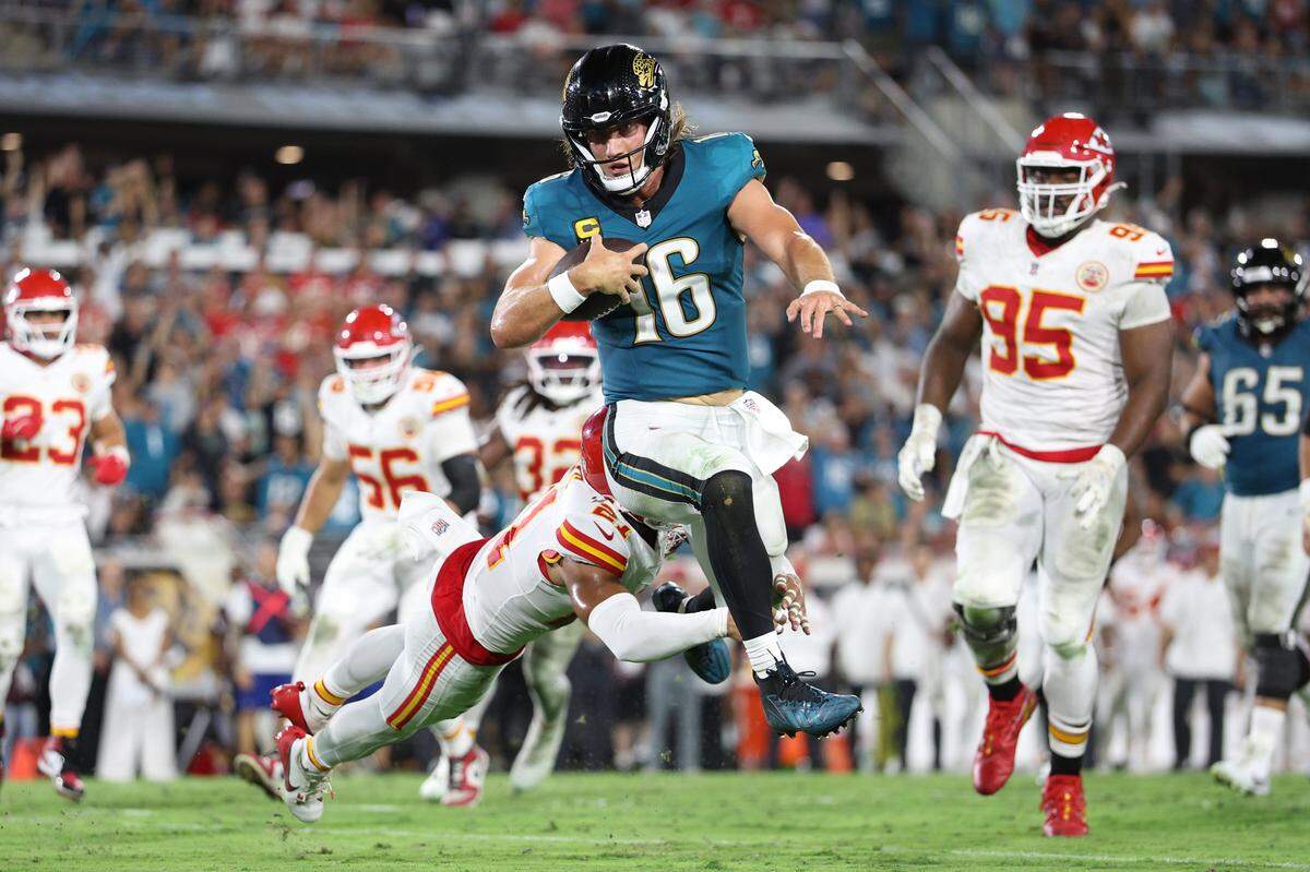Jaguars quarterback Trevor Lawrence scores a touchdown against the Kansas City Chiefs during an NFL game at EverBank Stadium in Jacksonville, Florida on Monday, Oct. 6, 2025.